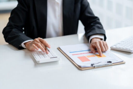close-up-of-business-woman-hands-check-company-fin